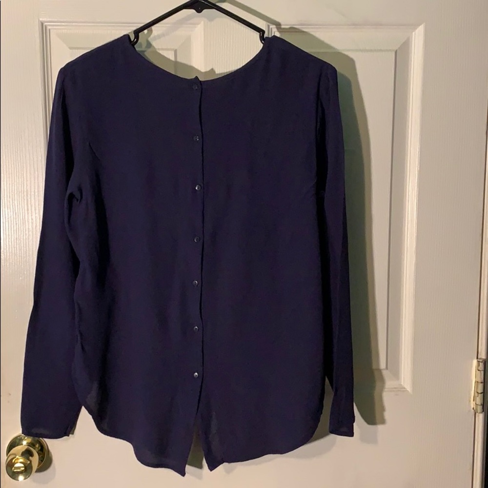 H & M Long sleeve top with button detail on back.